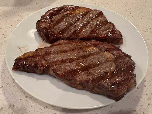 Remove ribeye from grill