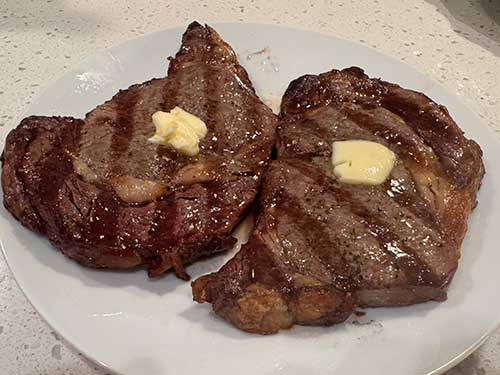 Butter the steaks