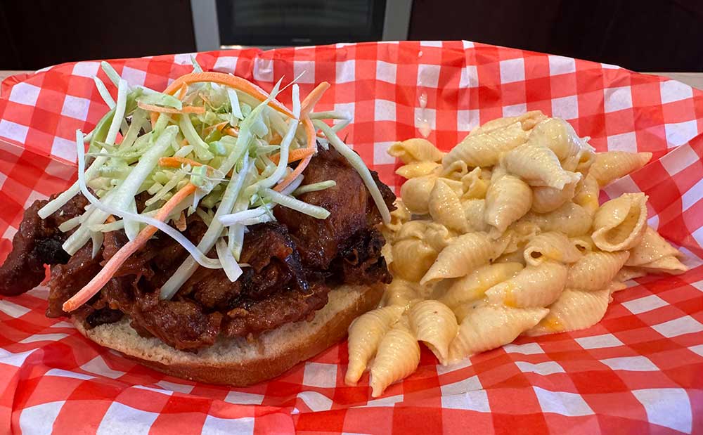 Pulled pork served with mac n cheese