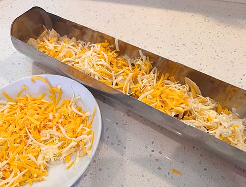 Add first layer of cheese