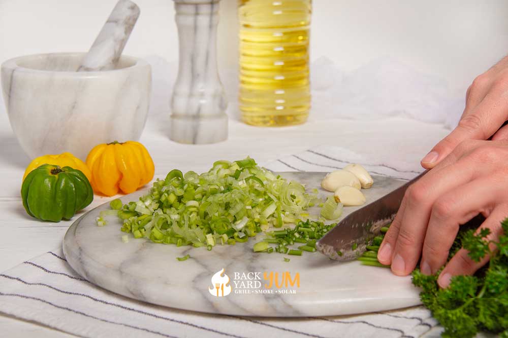 Finely chop the chimichurri ingredients