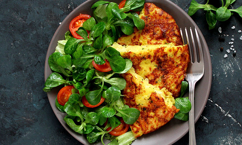 Solar oven Indian spiced frittata served with a salad