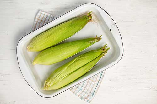 Soak the corn in the husks for about 30 minutes